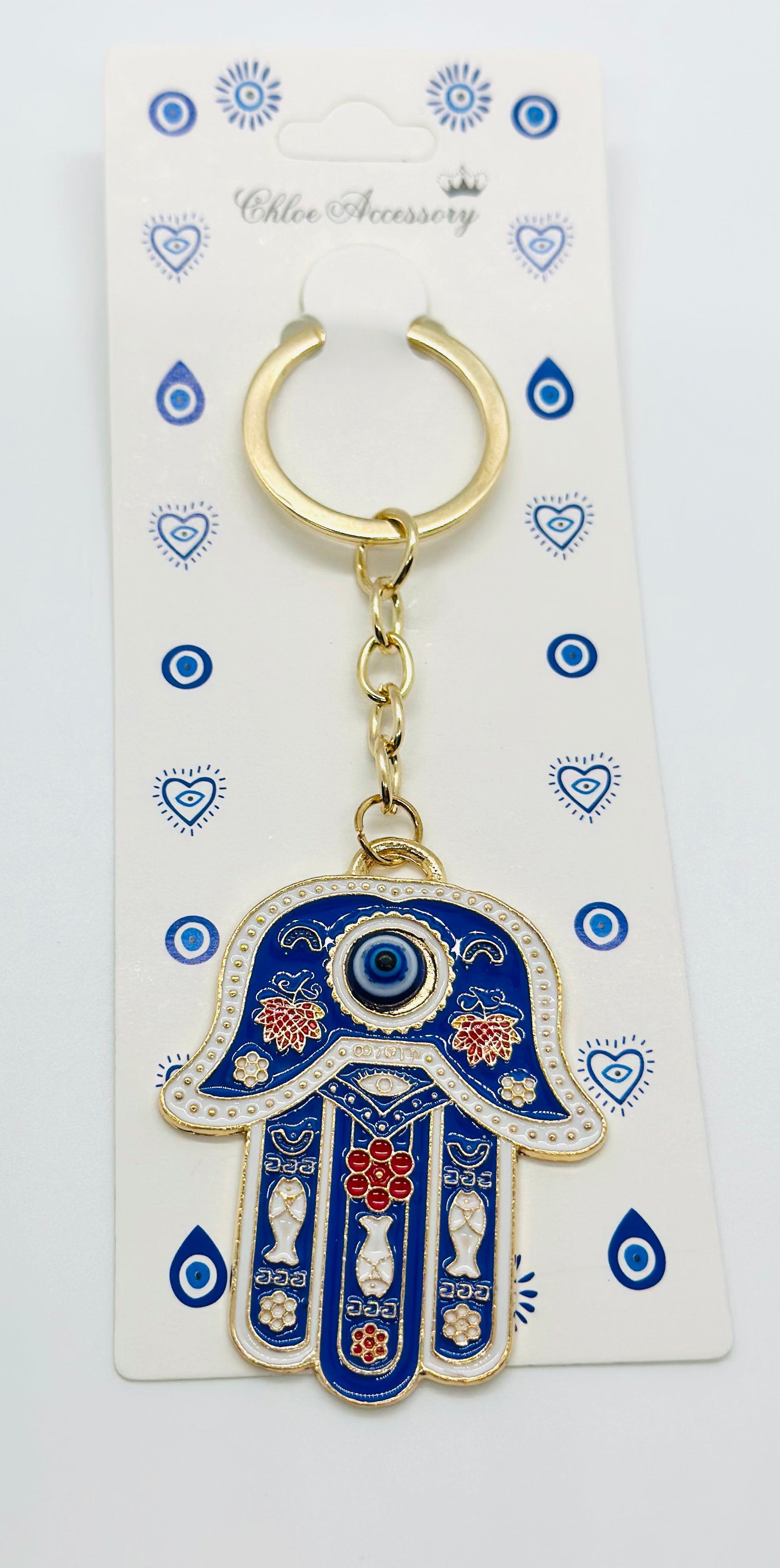 Golden Ojo Hand Keychain – Separate Times